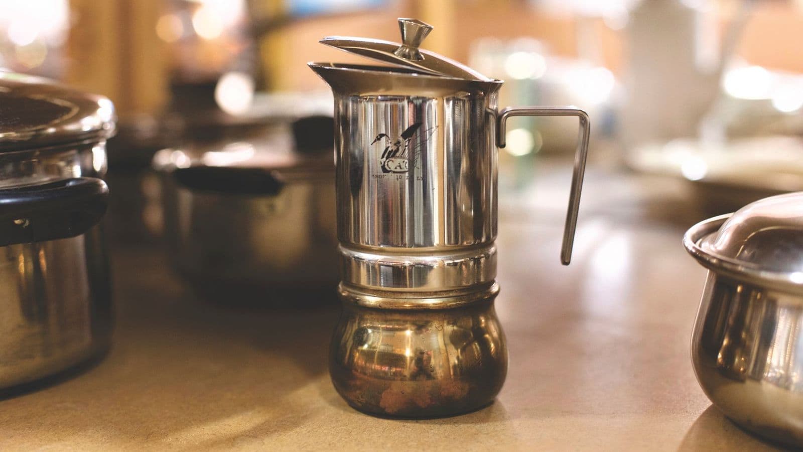 When should you replace a coffee maker: vintage coffee maker on a counter