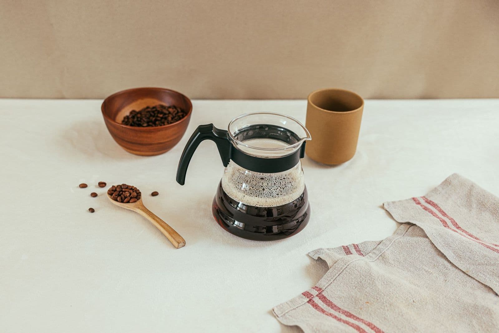 What is a drip coffee maker with a coffee pot and beans